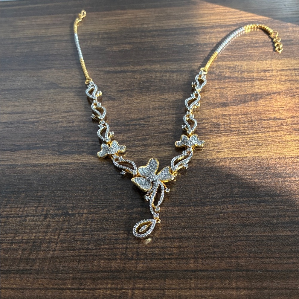 Elegant Gold and Silver Floral Necklace